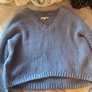 Blue knitted sweater cropped